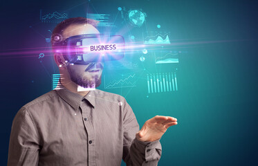 Businessman looking through Virtual Reality glasses