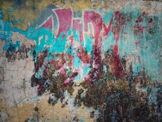 Fading grafitti on an old wall