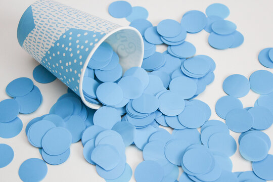 Blue Confetti Circles On White Background