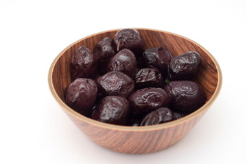 Black pickled olives in the bowl