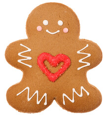 Christmas Gingerbread man sugar cookie in humanoid shape with red heart icing decoration isolated on white background