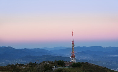 Telecommunication tower on Jaizkibel mountain at sunset., Euskadi