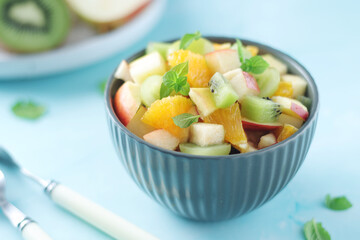 A bowl with fresh fruit salad