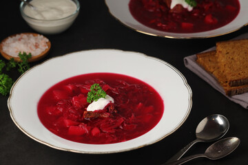 A plate with Ukrainian national dish - borsch