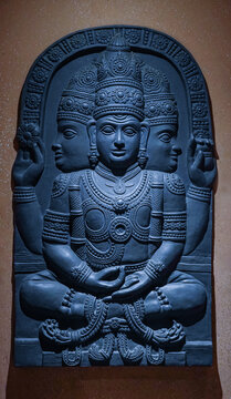 statue of brahma three head