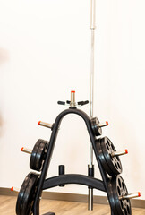 Close up shot of various gym equipment and weights. Fitness