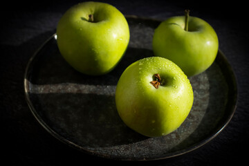 Fresh apples on old background
