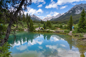 Ink Pots in Banff National Park during summer - tourists enjoy the view
