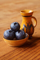 Background with berries - fresh bilberry; Vaccinium Myrtillus