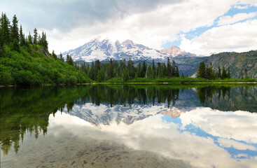 Bench Lake with Mount Rainier reflection on a cloudy day. Bench Lake is along the Bench and Snow Lake trail in Mt Rainier National park, Washington. 