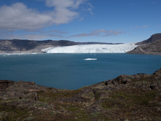 Fototapeta na wymiar The stunning Eqi Glacier (Eqip Sermia), a rapidly retreating outlet glacier, north of the disko Bay in Western Greenland