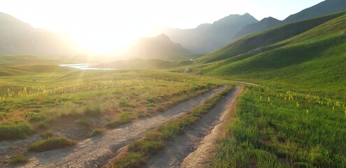 Fototapeta premium meadow and hills next to the water dam _Iran