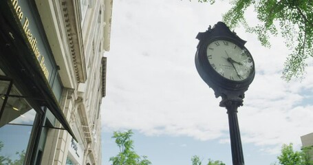 Clock tower and shops on main street in Greenwich Connecticut in summer
