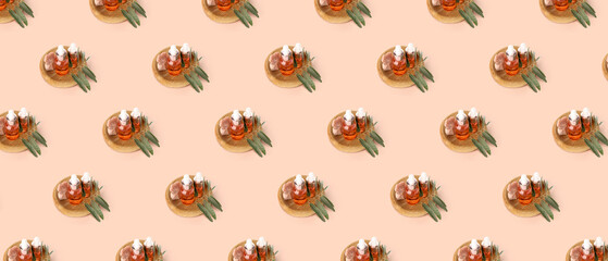 Many bottles of olive essential oil on beige background. Pattern for design