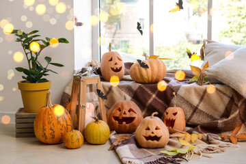 Creative decorations for Halloween party near window in room