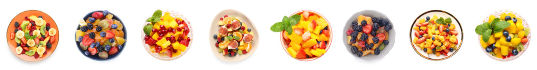 Set of delicious fruit salads on white background, top view