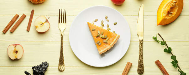 Composition with slice of tasty pumpkin pie on wooden background
