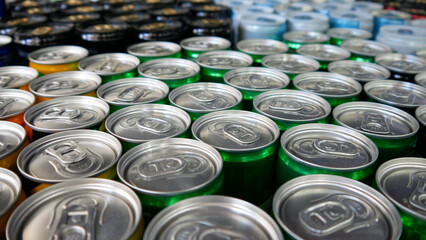 Close-up of many different colorful soda cans
