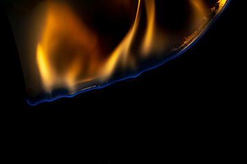 burning plastic close up, plastic is burning, melts and drips