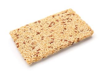 Sweet sesame kozinaki on white background