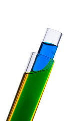 Blue and yellow food coloring in two test tubes