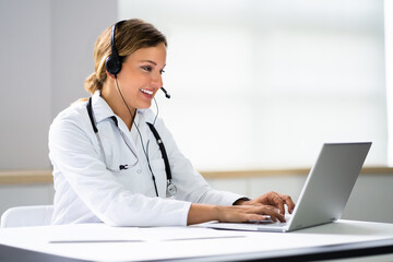 Happy Hospital Receptionist With Headset
