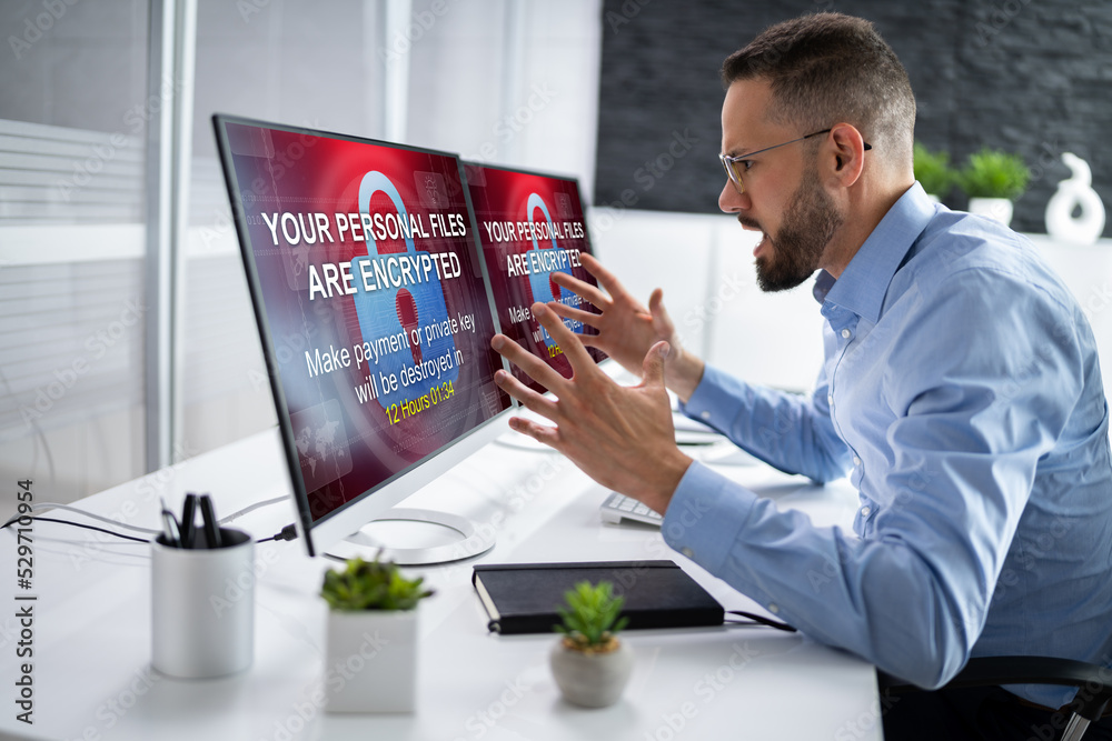 Aufkleber ransomware malware attack. business computer hacked