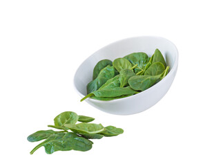 Green spinach leaves in the white ceramic bowl isolated transparent png