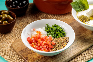 Fresh Chanklish served in a dish isolated on cutting board side view of healthy food bowl