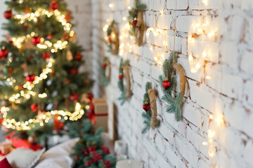 Hanging Christmas wreaths with lights