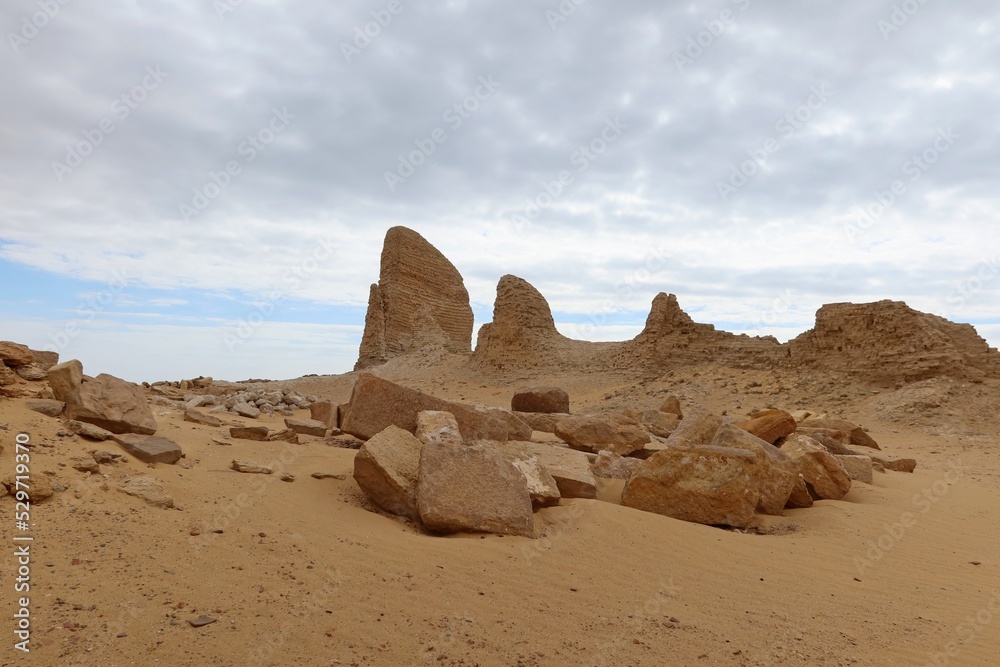 Wall mural the walls and ruins of dimeh el sibaa (soknopaiou nesos) in fayoum city desert in egypt