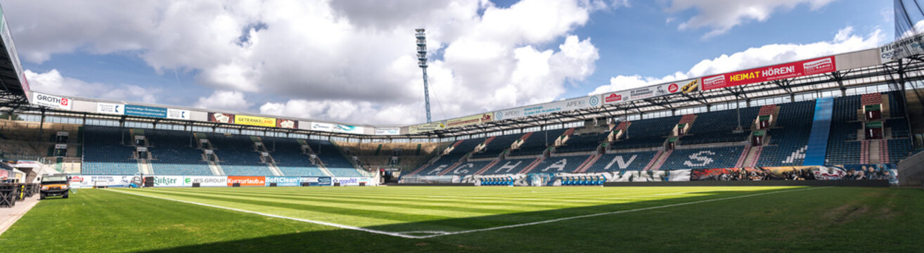 Panoramic wide view inside Ostseestadion, home stadium of FC Hansa Rostock. Rostock, Mecklenburg-Vorpommern, Germany - May 2022