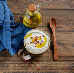 Fototapeta na wymiar bowl of sour cream or greek yogurt