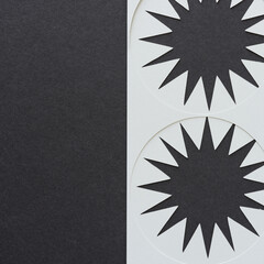 star bursts and circle stencil on dark gray paper