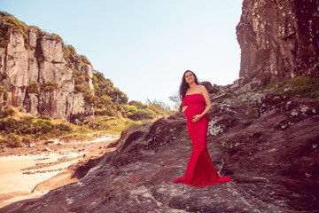 Pregnant woman in red dress