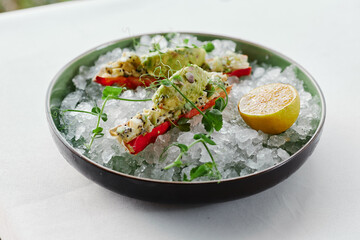 crab cooked in a restaurant and served on ice