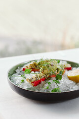 crab cooked in a restaurant and served on ice