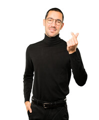 Young man making a gesture of worried about his economy