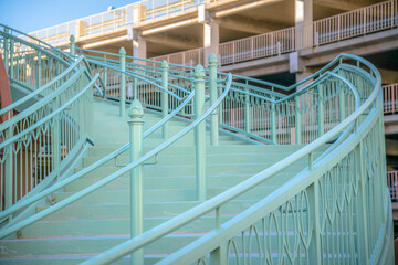 Curved green staircase outdoors at downtown Tucson, Arizona