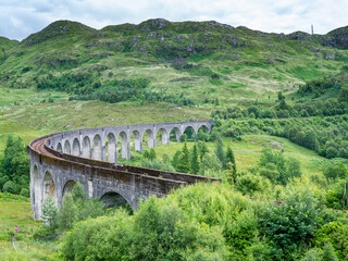 Fototapeta na wymiar Panorama of Glenfinnan Viaduct,amongst beautiful,summertime Scottish Highland scenery,Glenfinnan, Scotland, UK.