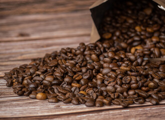 Coffee beans on wood background