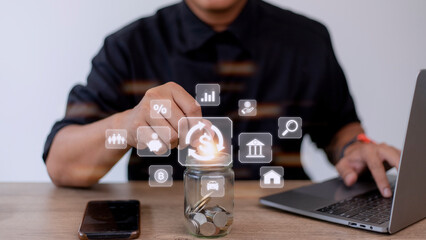 Fototapeta premium Businessman using a computer to Concept of fund financial investment management portfolio diversification