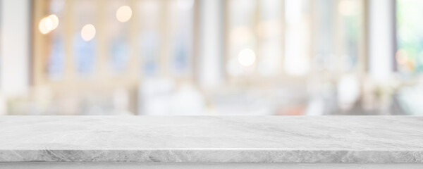 Empty white marble stone table top and blur glass window interior cafe and restaurant banner mock up abstract background - can used for display or montage your products. - 529736744