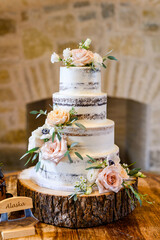 Multi tiered wedding cakes with blooms