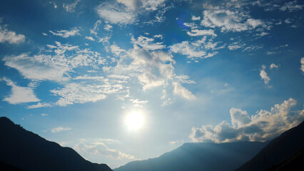 Beautiful landscape mountain green field grass meadow white cloud blue sky on sunny day. Majestic green scenery big mountain hill cloudscape valley panorama view in countryside greenery pasture