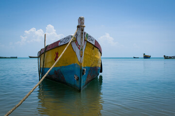 longtail boats,Rameswaram is featured with no waves at all times.