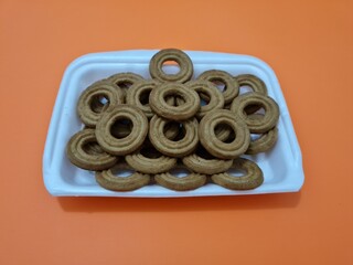 Snacks made from flour and other ingredients with chocolate flavor are called cookies