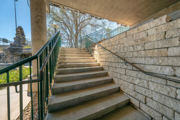 San Antonio, Texas- Staircase below a concrete bridge