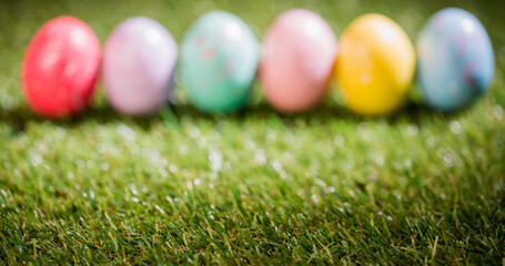 Image of colourful easter eggs on grass