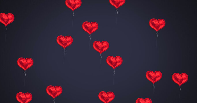 Multiple heart shaped balloons floating against black background